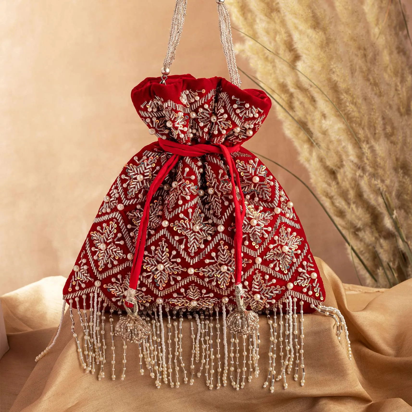 Carmine Red Potli Hand Embroidered In Raw Silk